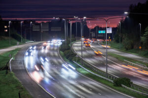 The highway traffic in the summer night in Finland.